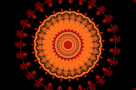 Red with yellow an ornament on a black backgroundの写真素材