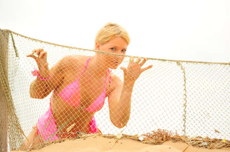 Portrait of the girl with a fishing netの写真素材