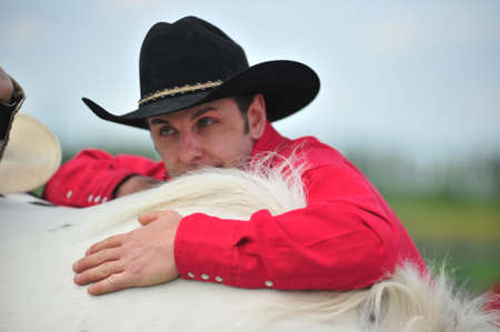 Portrait of a mid-adult Caucasian male wearing cowboy hat.の写真素材