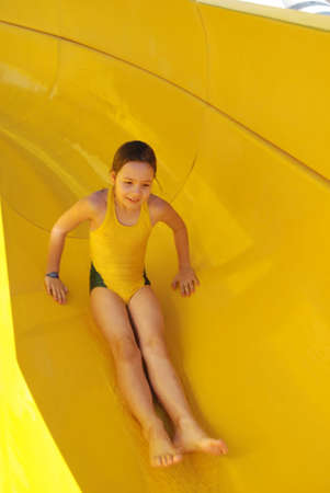 The girl sliding from a waterslide