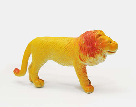  	An African lion male plastic toy for kids isolated on white studio backgroundの写真素材