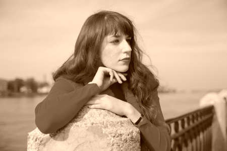 The girl on quayの写真素材