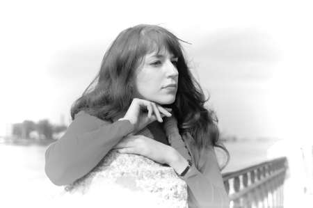 The girl on quayの写真素材