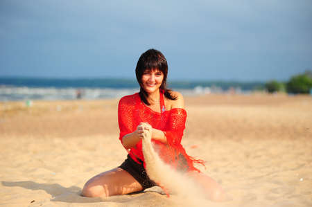 Portrait of beautiful woman on the beachの写真素材