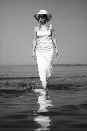 girl in white dress in the seaの写真素材