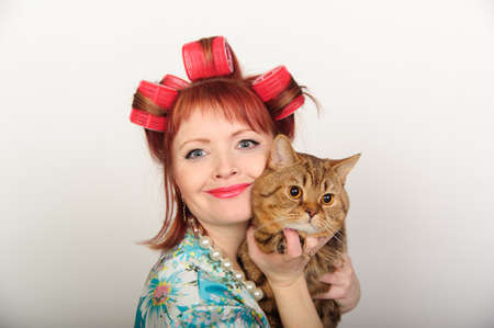 Portrait of a housewife with a catの写真素材