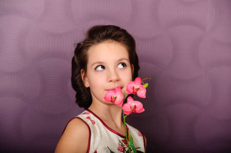 girl with an orchidの写真素材