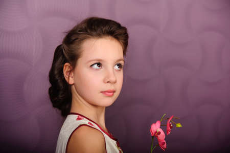 girl with an orchidの写真素材