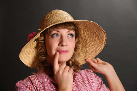 bin up girl in a straw hatの写真素材