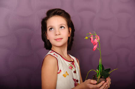 girl with an orchid の写真素材