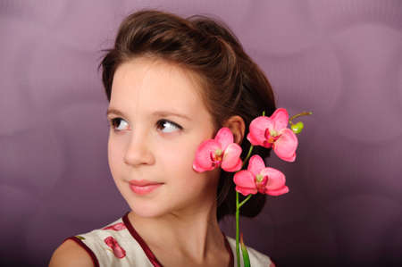 girl with an orchid の写真素材