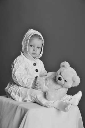 baby and teddy bearの写真素材