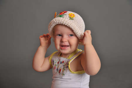 Cute baby girl in summer hat