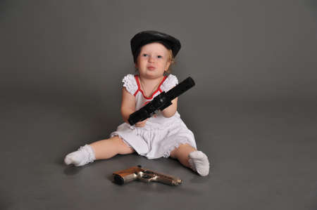 Danger - little girl with gun