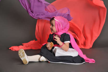 Elegant old-fashioned dressed little girl の写真素材