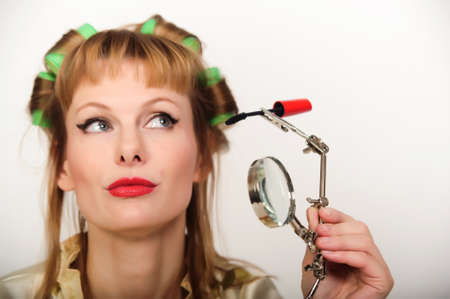 girl doing makeupの写真素材