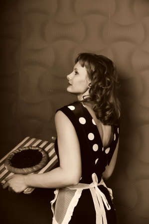 young woman baked a cakeの写真素材