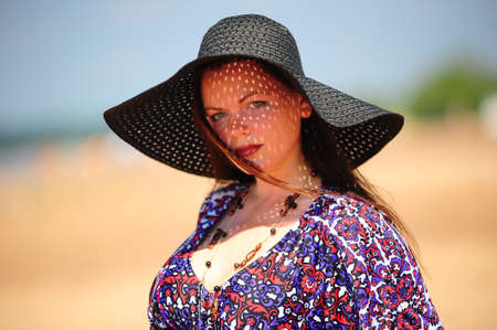 young woman in a big hat.の写真素材