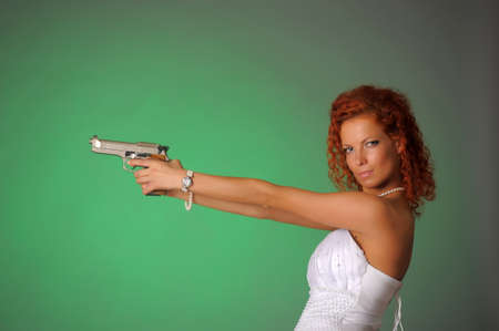 beautiful bride with a gunの写真素材