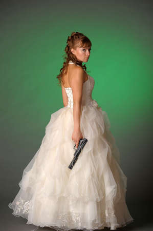 beautiful bride with a gunの写真素材