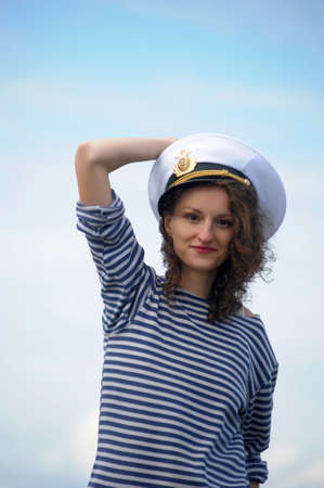 woman in a captain's peak-capの写真素材