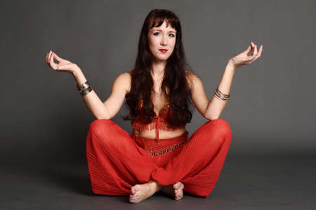 the woman in red east suitの写真素材