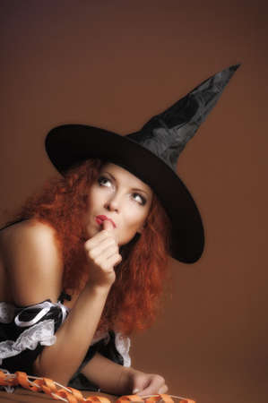 Sexy redheaded witchの写真素材