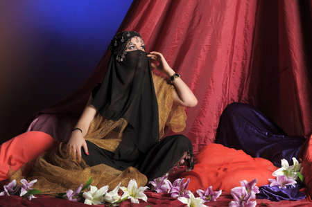 Beautiful asian girl with black veil on face 