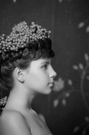Girl with ashberriesの写真素材