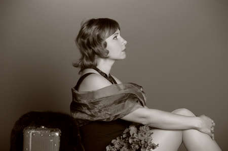 The woman with the old  Suitcaseの写真素材