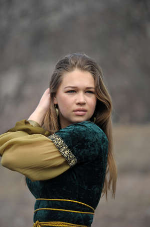 young girl in a medieval dressの写真素材