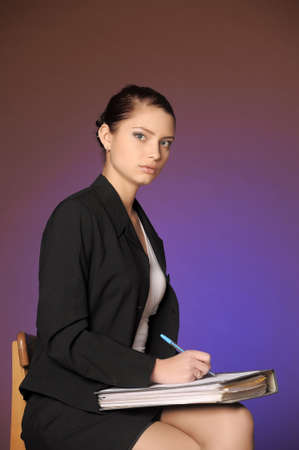 Business the woman with folders of papersの写真素材