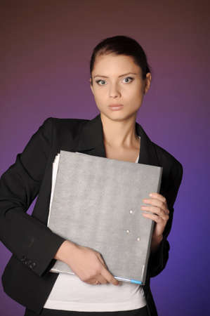 Business the woman with folders of papers