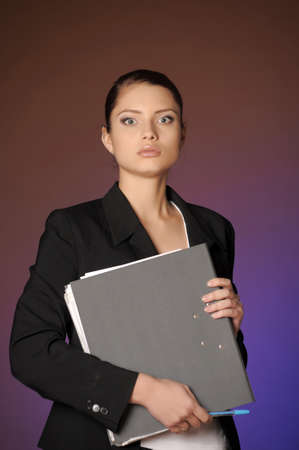 Business the woman with folders of papersの写真素材