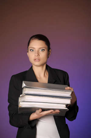 Business the woman with folders of papers