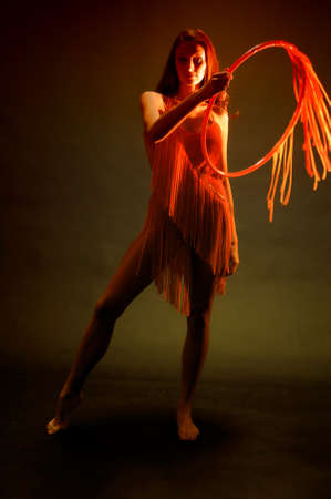 gymnast in red with a hoop