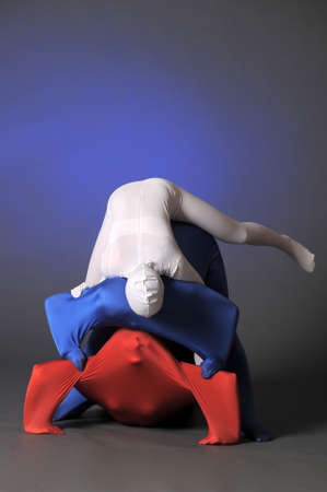three figures in white, red and blueの写真素材