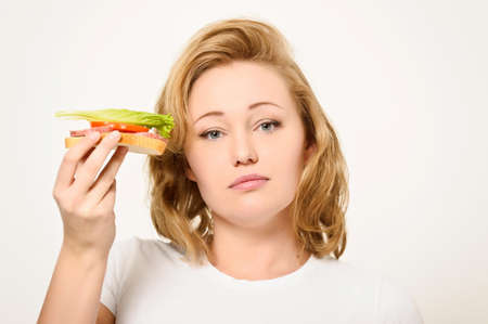 Woman with sandwich の写真素材