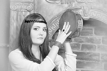 Attractive girl with music instrumentの写真素材