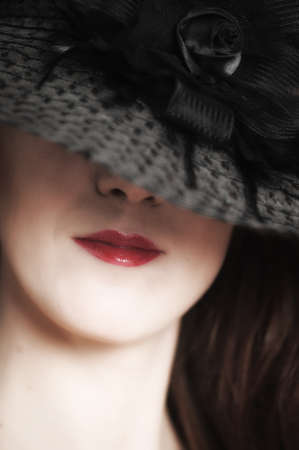 The woman in a wide-brimmed hat 