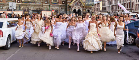 Action Â«Run-away brides of CosmopolitanÂ» â a flashmob of long-distance scale which was spent the seventh year.  Russia, St. Petersburgのeditorial素材