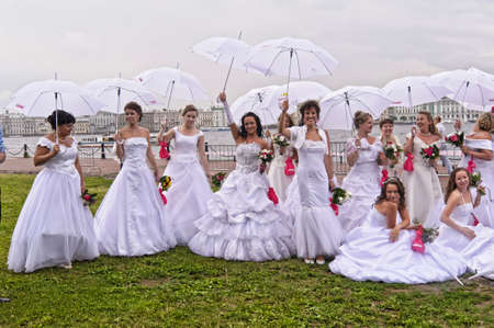 Action Â«Run-away brides of CosmopolitanÂ» â a flashmob of long-distance scale which was spent the seventh year.  Russia, St. Petersburgのeditorial素材