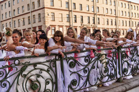 Action Â«Run-away brides of CosmopolitanÂ» â a flashmob of long-distance scale which was spent the seventh year.  Russia, St. Petersburgのeditorial素材