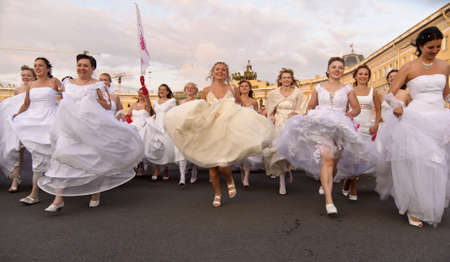 Action Â«Run-away brides of CosmopolitanÂ» â a flashmob of long-distance scale which was spent the seventh year.  Russia, St. Petersburgのeditorial素材