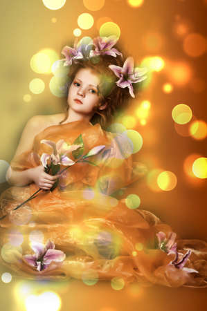 girl with lilac lilies in her hairの写真素材