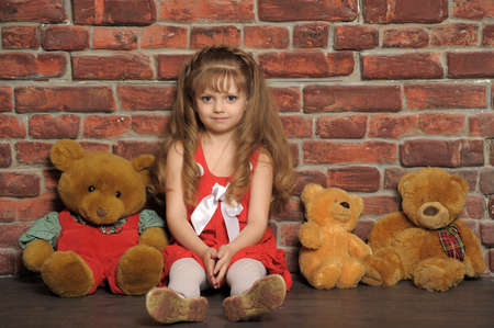 little girl with three bearsの写真素材