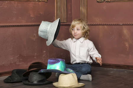 the boy measures at once many hatsの写真素材