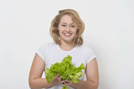 Girl and salad leafs