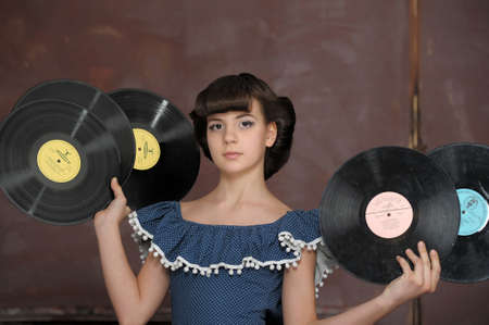 the girl with vinyl recordsの写真素材