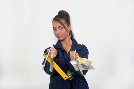 the girl with the tools in the hands 